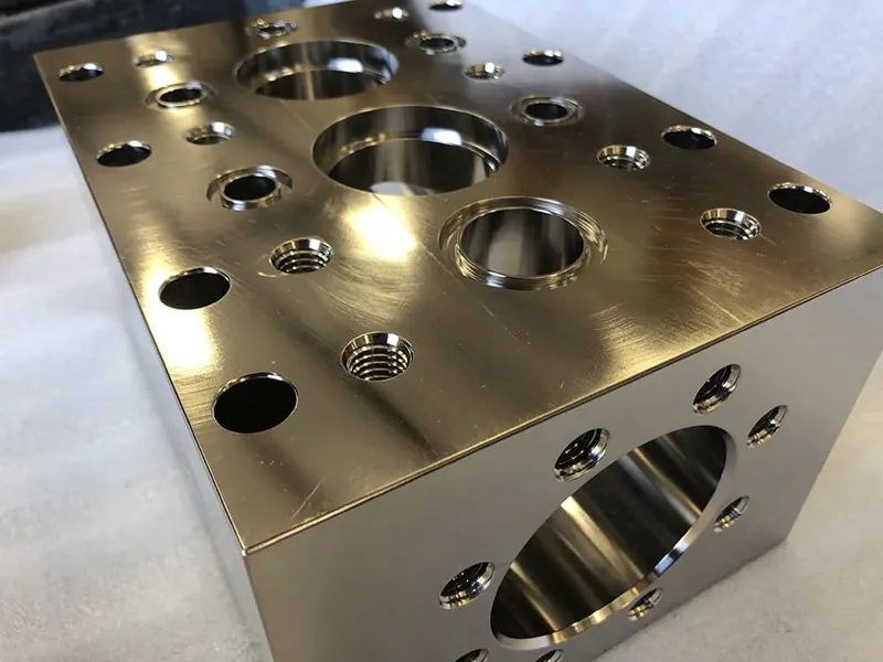 Electropolished stainless steel manifold block for oil and gas service at Harrison Electropolishing